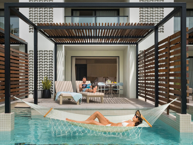 Swim-up suite terrace with direct pool access
