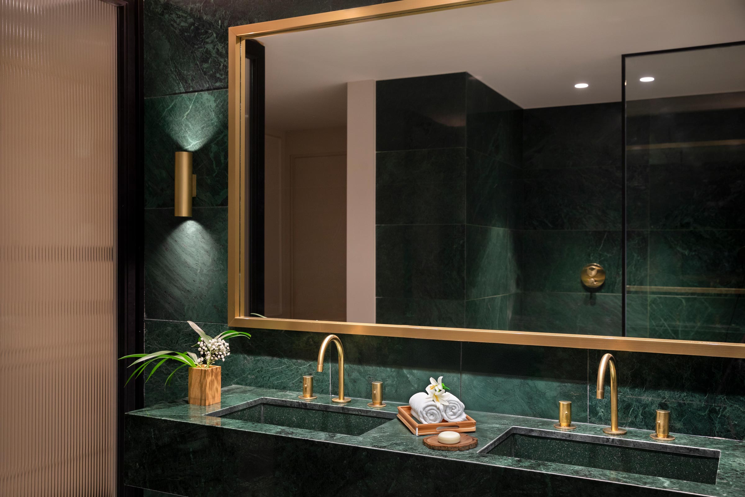 Beautiful bathroom mirror and sink in an Imperial suite